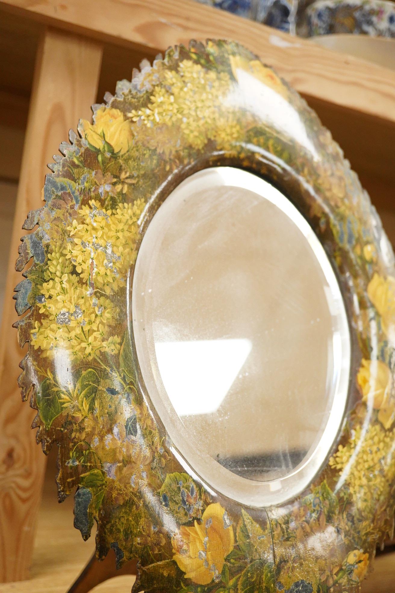 A framed botanical print, circular mirror, floral wood block and a set of 6 metal place mats